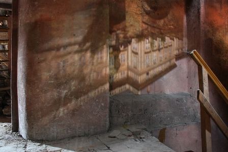 Camera obscura image of the New Royal Palace in Prague Castle, via Wikipedia user Gampe.) 