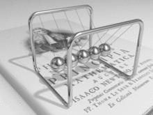 Newton's cradle animation, via Wikipedia