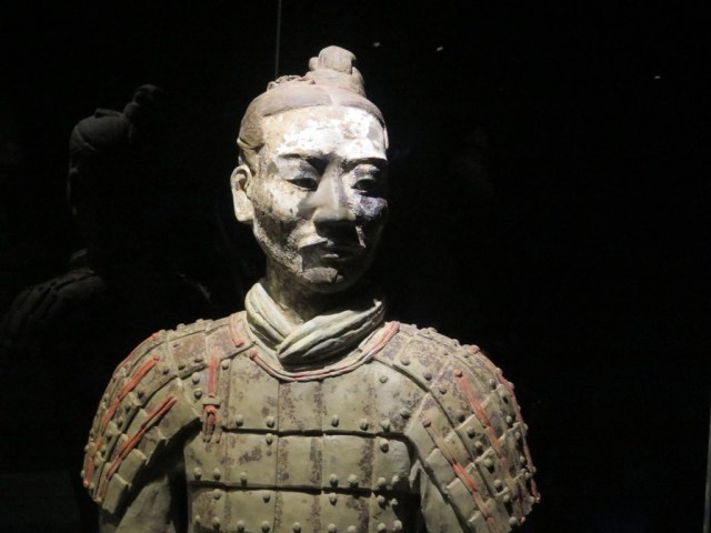 A pale-faced kneeling archer.