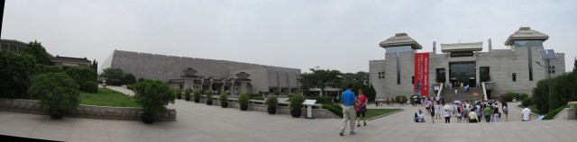 Panorama of the Terracotta Army complex.  The curved building on the left houses Pit 1, the middle building houses Pit 2, and the rightmost building is a museum.  The building for Pit 3 is behind Pit 2.