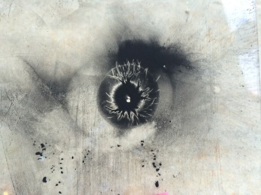 A dimensional portal-looking figure.