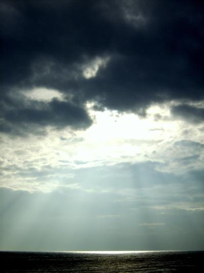 Sunlight peeking through the clouds, via Wikipedia.